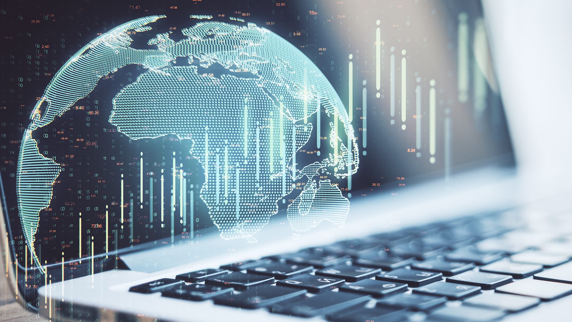 Laptop with global image and investment chart overlay.