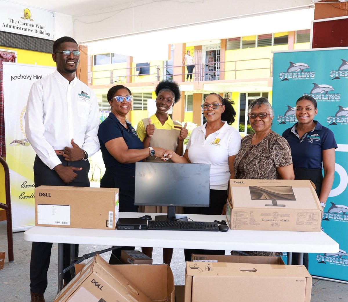 Sterling presents donated Dell computers to Anchovy High supporting digital learning.